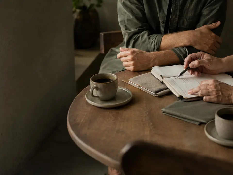 Two people having a focused working conversation